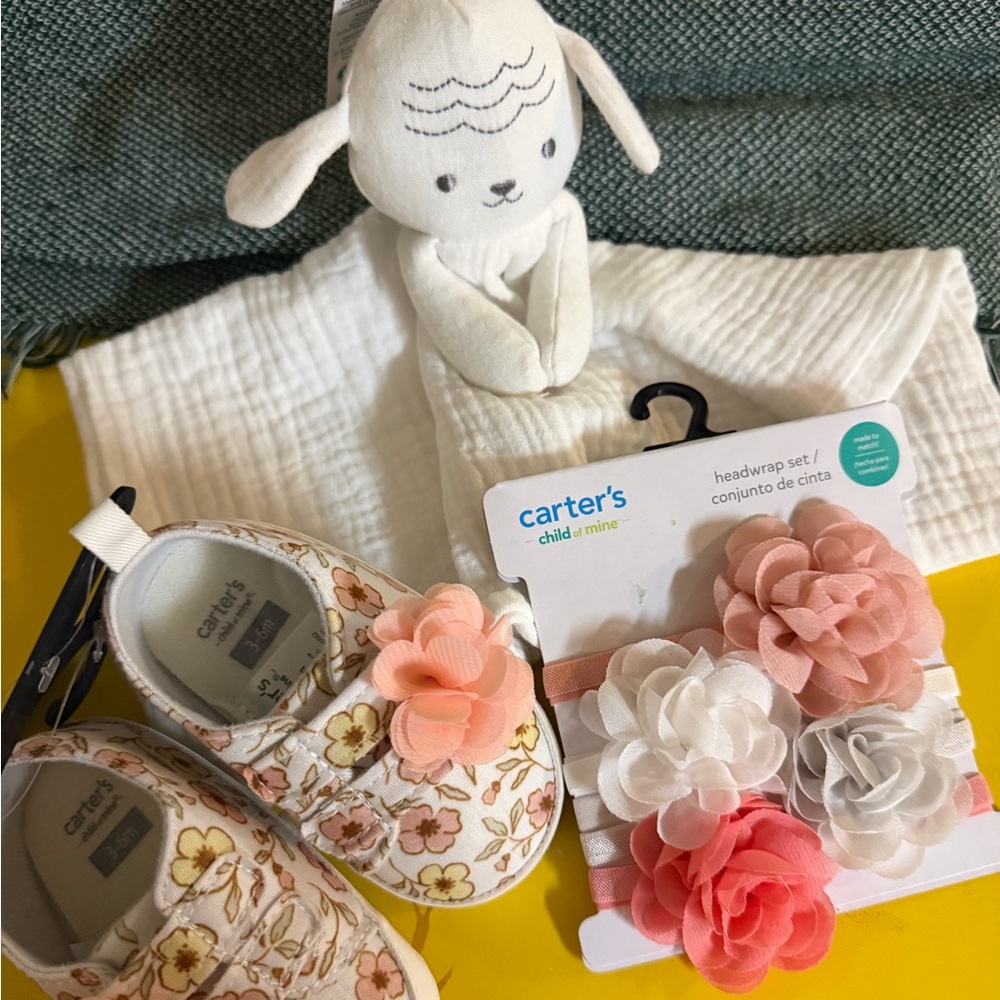 Perfect baby shower gift for a little girl, hair, ties shoes, and a toy blanket